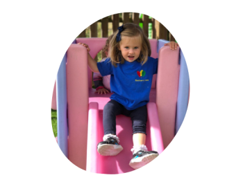 girl on slide in playground